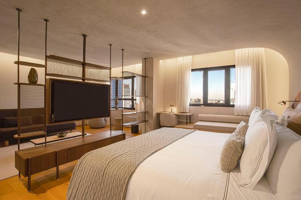 Qoya Hotel Curitiba, Curio Collection By Hilton Exterior foto A room at the hotel